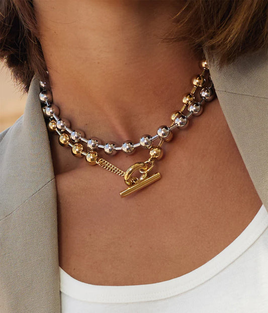 Collar Numa, Acero Dorado